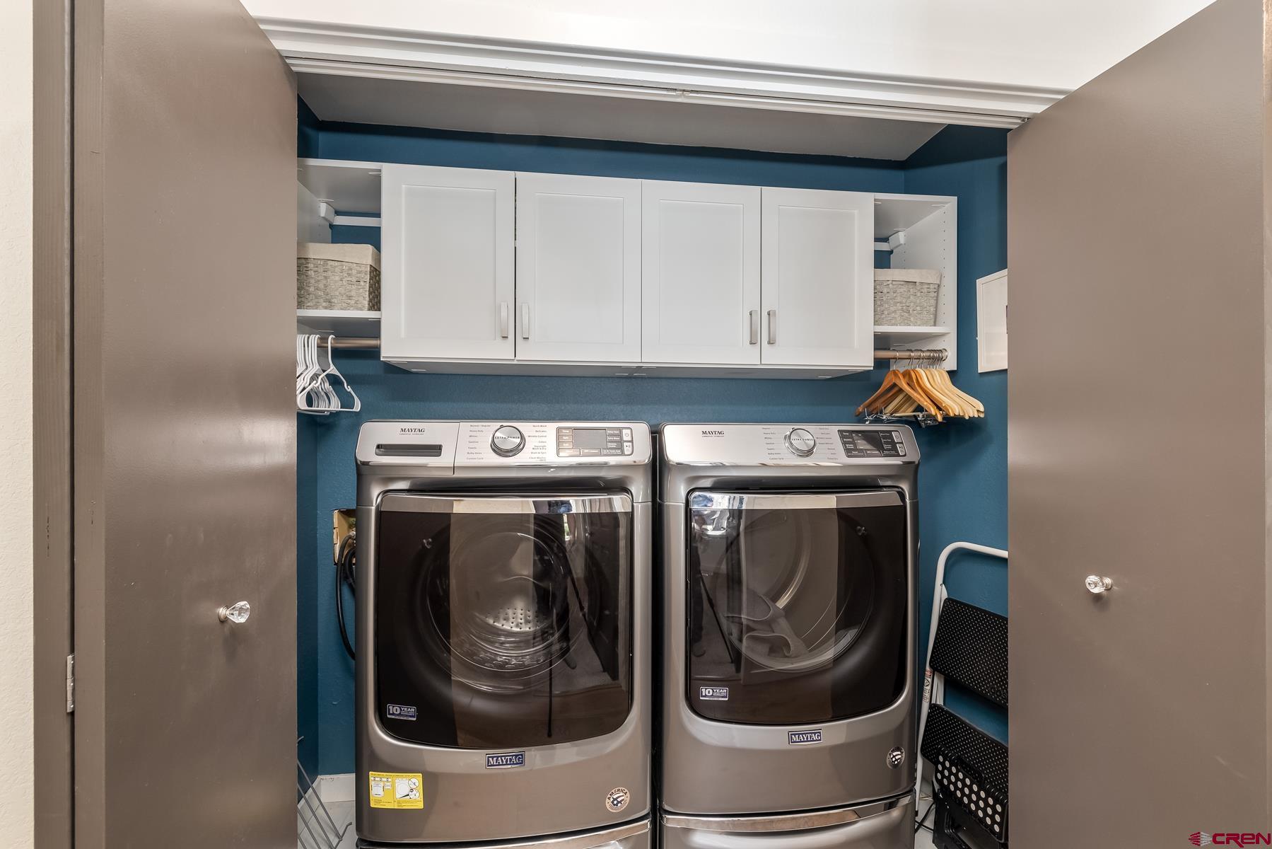 389 Apache Road Gunnison, CO 81230 - Photo 27 of 43 a utility room with dryer and washer