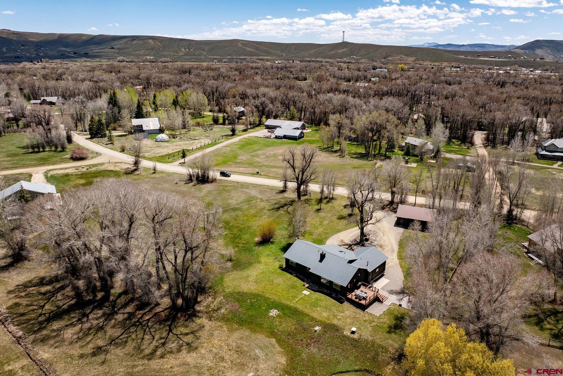 389 Apache Road Gunnison, CO 81230 - Photo 35 of 43 a view of a lake in middle of the town