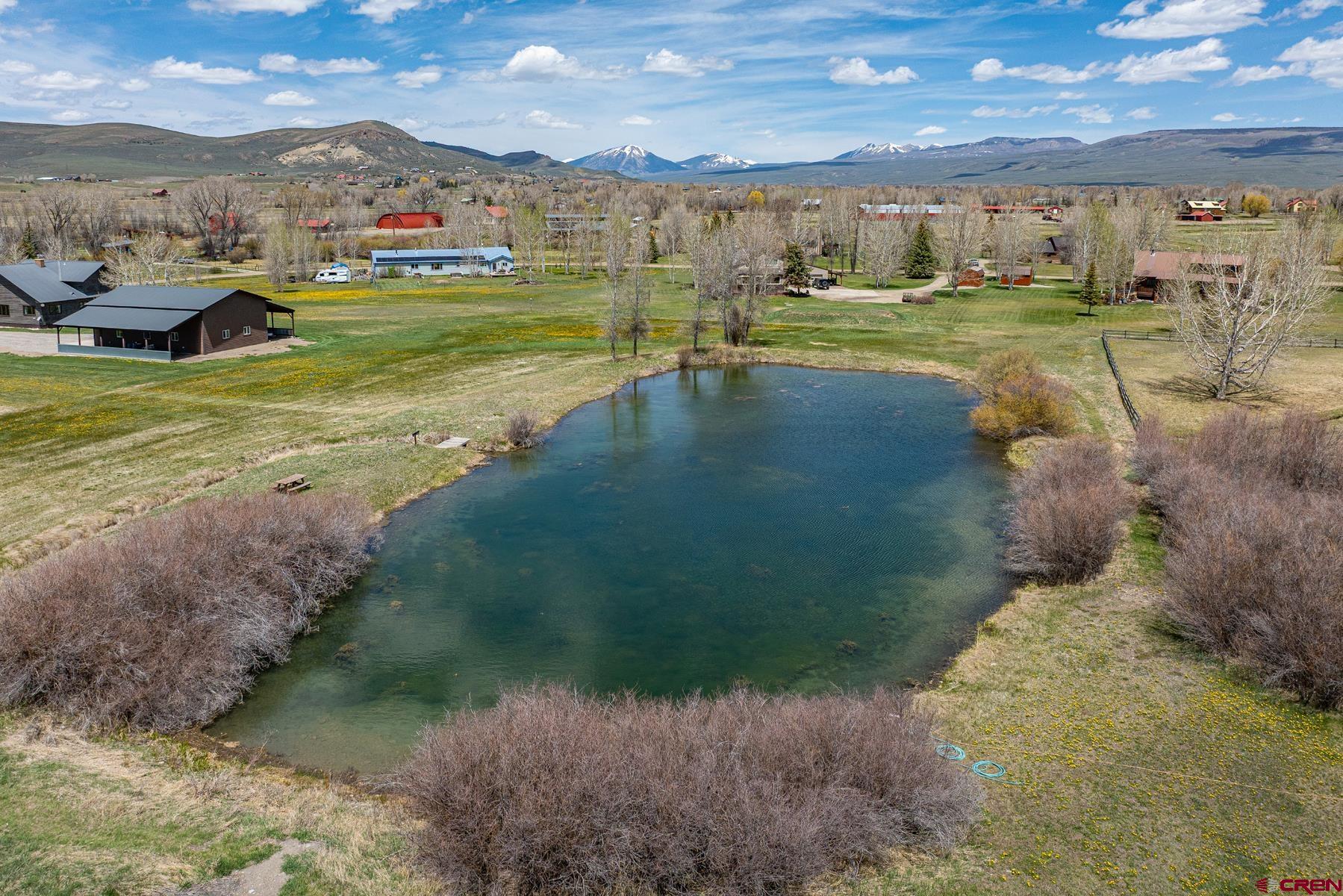 389 Apache Road Gunnison, CO 81230 - Photo 41 of 43 a view of a lake with houses