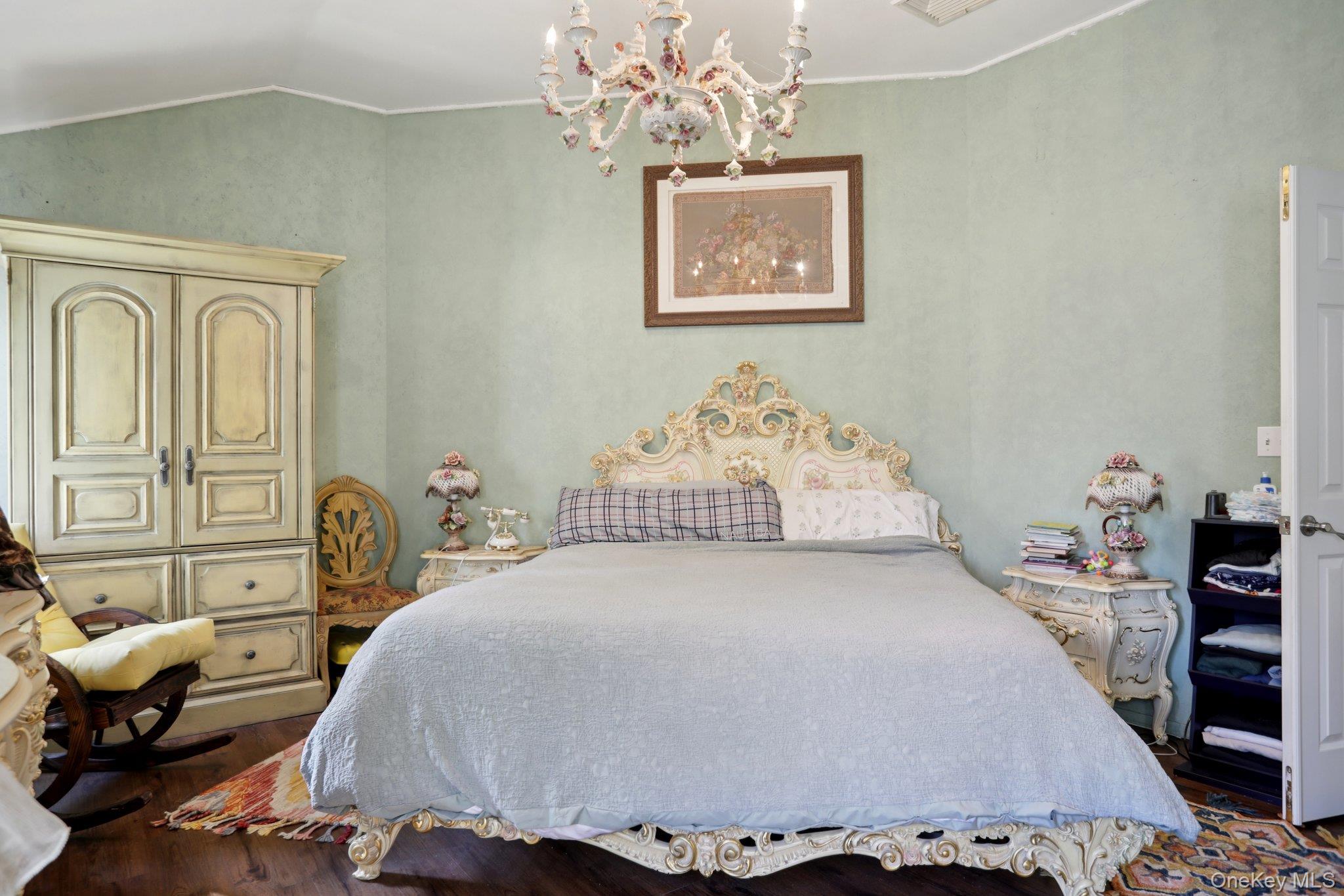 30 Reed Court Washingtonville, NY 10992 - Photo 13 of 36 a bedroom with a bed and a dresser with rug