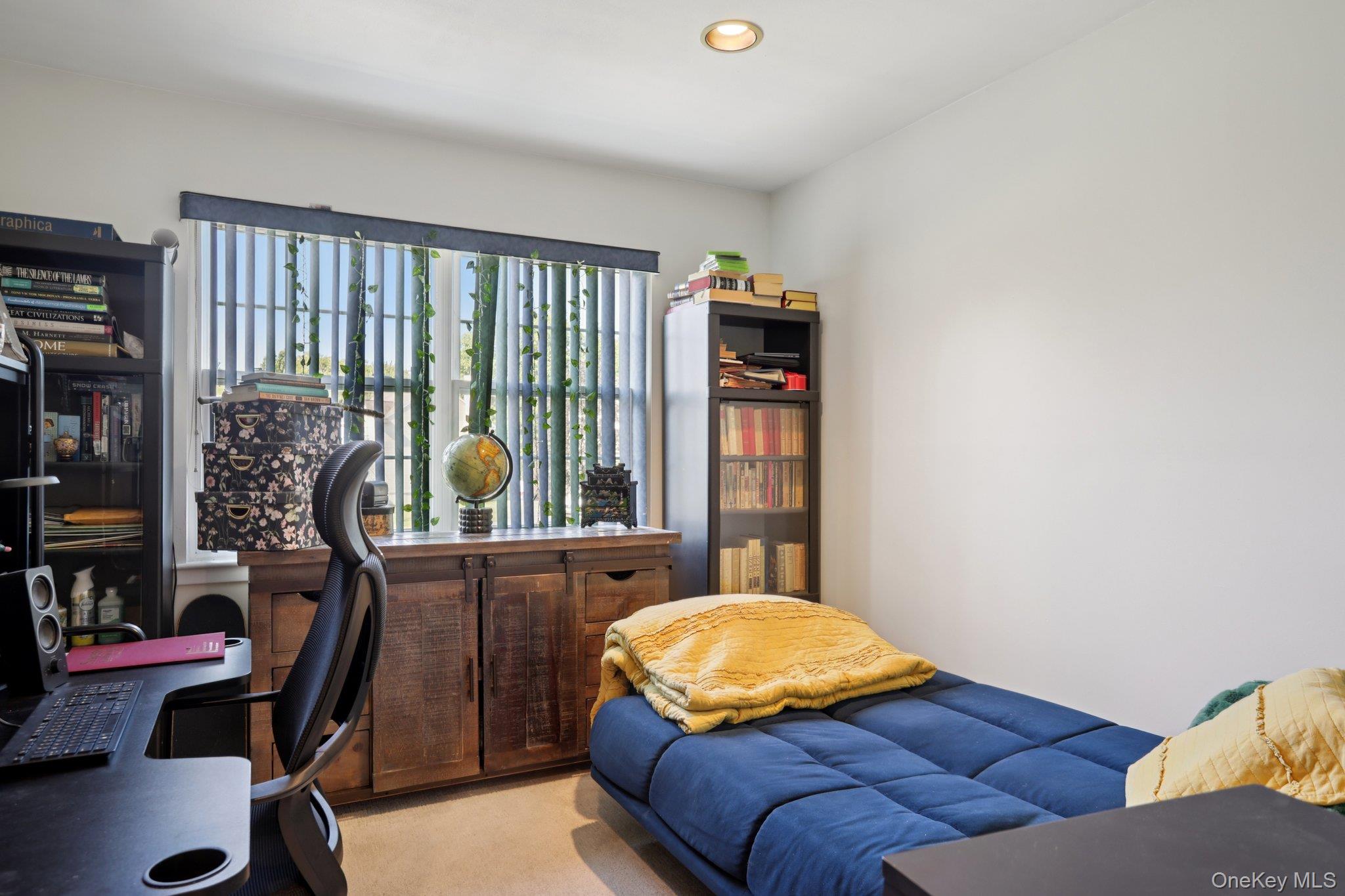 30 Reed Court Washingtonville, NY 10992 - Photo 18 of 36 a bedroom with a bed and wooden floor