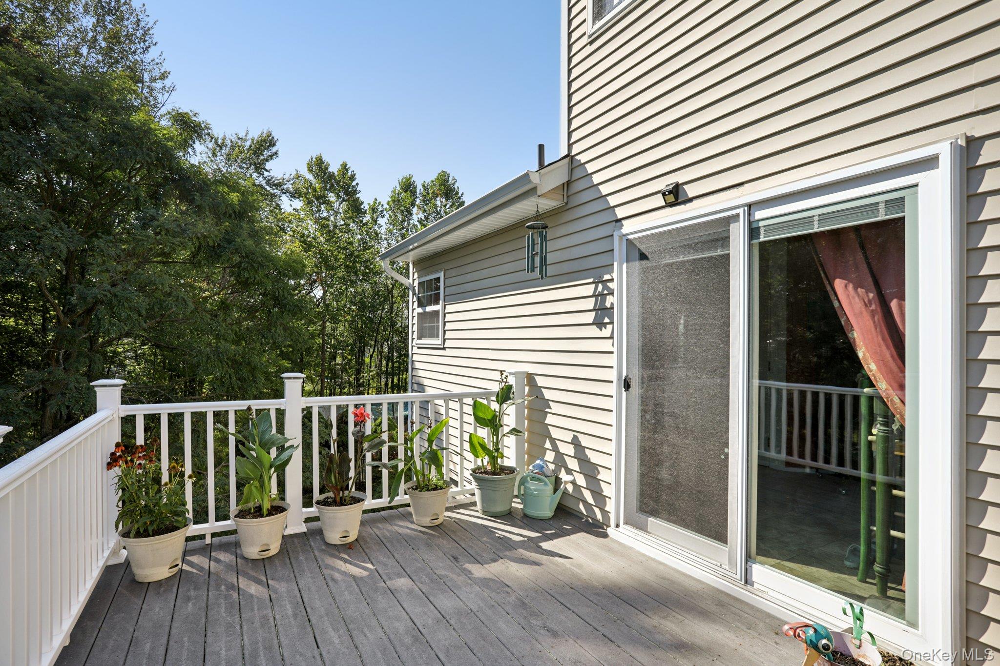 30 Reed Court Washingtonville, NY 10992 - Photo 28 of 36 a view of backyard with a deck