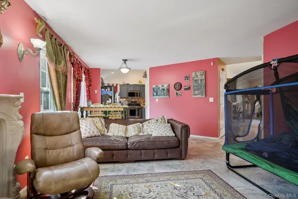 a living room with furniture and a couch