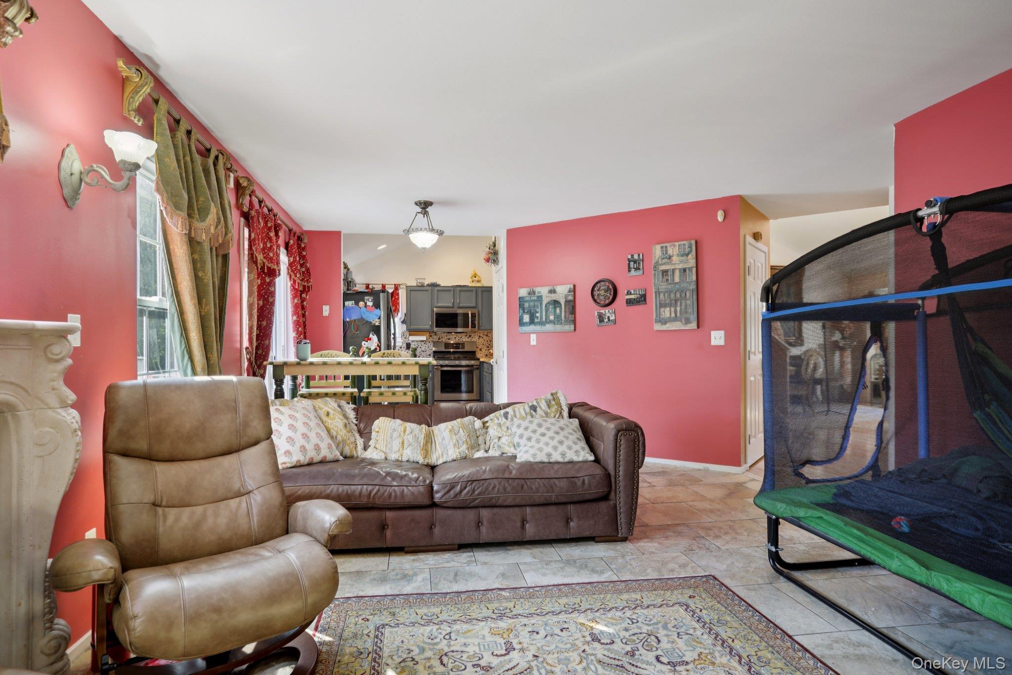 30 Reed Court Washingtonville, NY 10992 - Photo 5 of 36 a living room with furniture and a couch