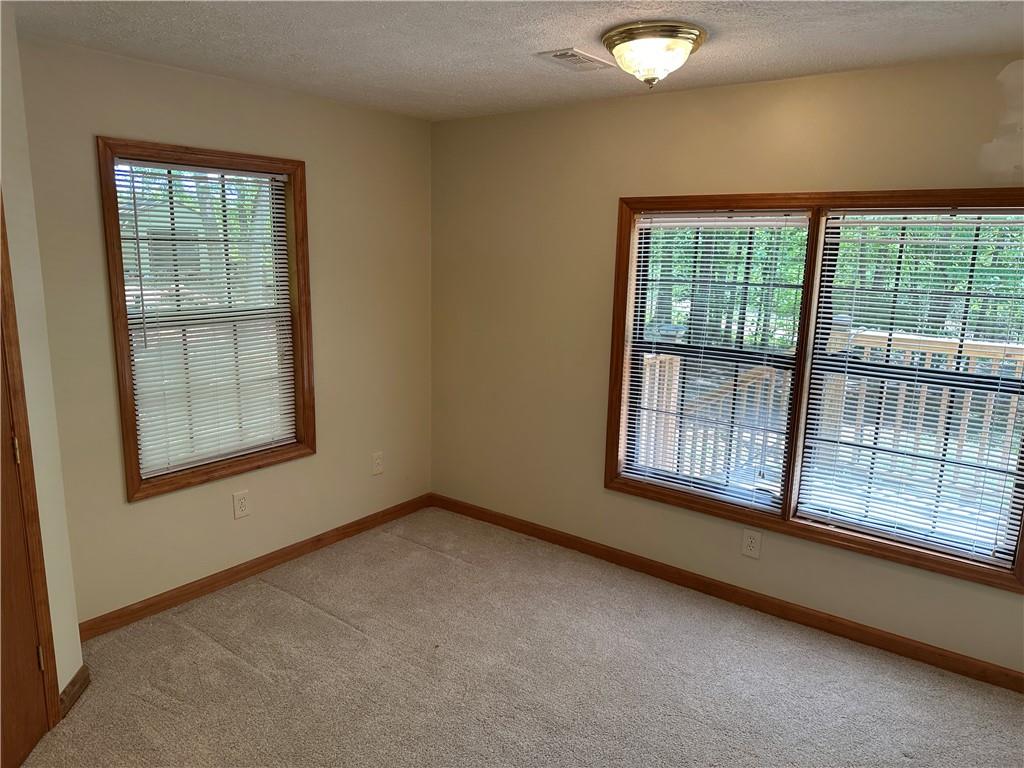 710 Spiva Road Temple, GA 30179 - Photo 11 of 31 an empty room with a window