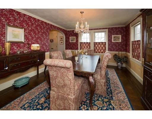 153 Walnut Hill Road Brookline, MA 02467 - Photo 3 of 9 a living room with furniture and a chandelier