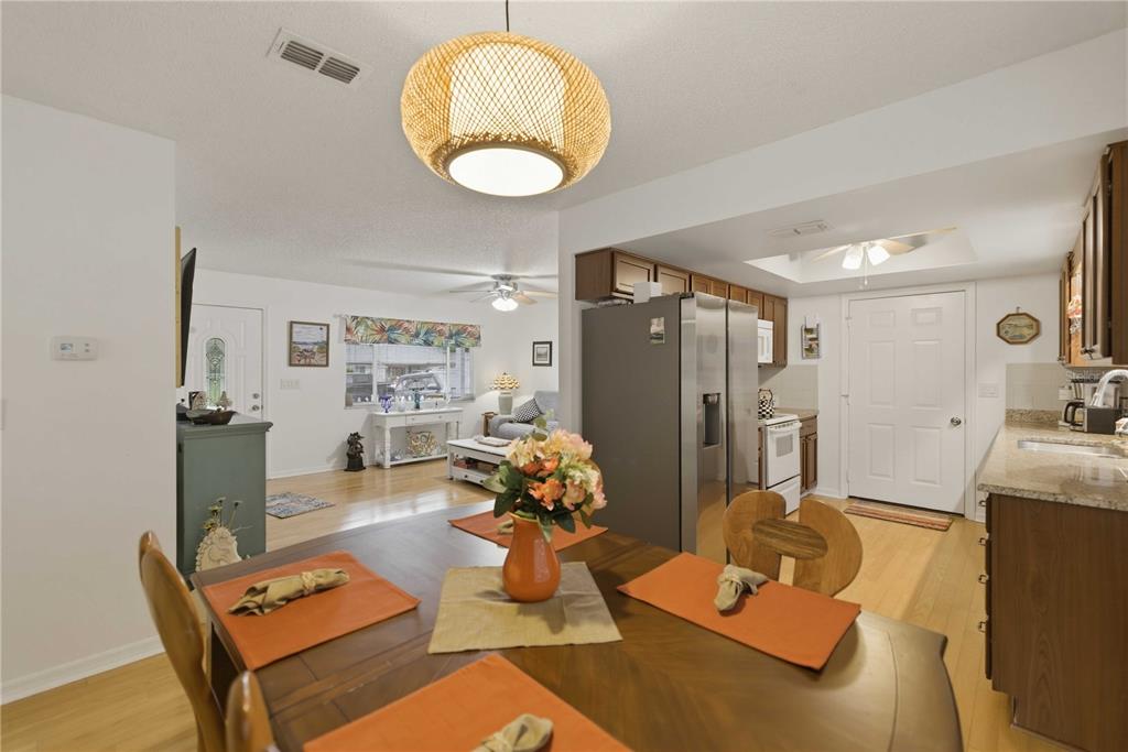 17577 Southeast 104th Circle Summerfield, FL 34491 - Photo 11 of 27 a room with furniture and a mirror