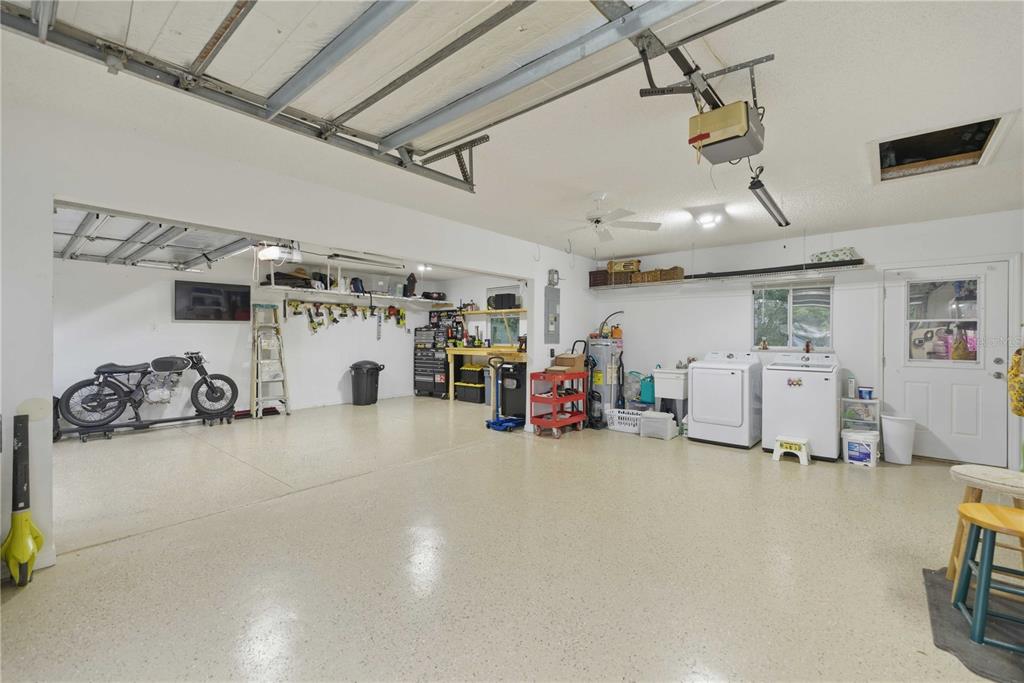 17577 Southeast 104th Circle Summerfield, FL 34491 - Photo 4 of 27 a view of a garage with storage