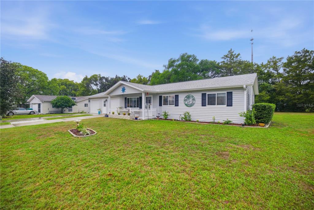17577 Southeast 104th Circle Summerfield, FL 34491 - Photo 5 of 27 a view of house with a swimming pool