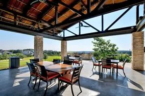 a dining room with furniture window and outdoor view