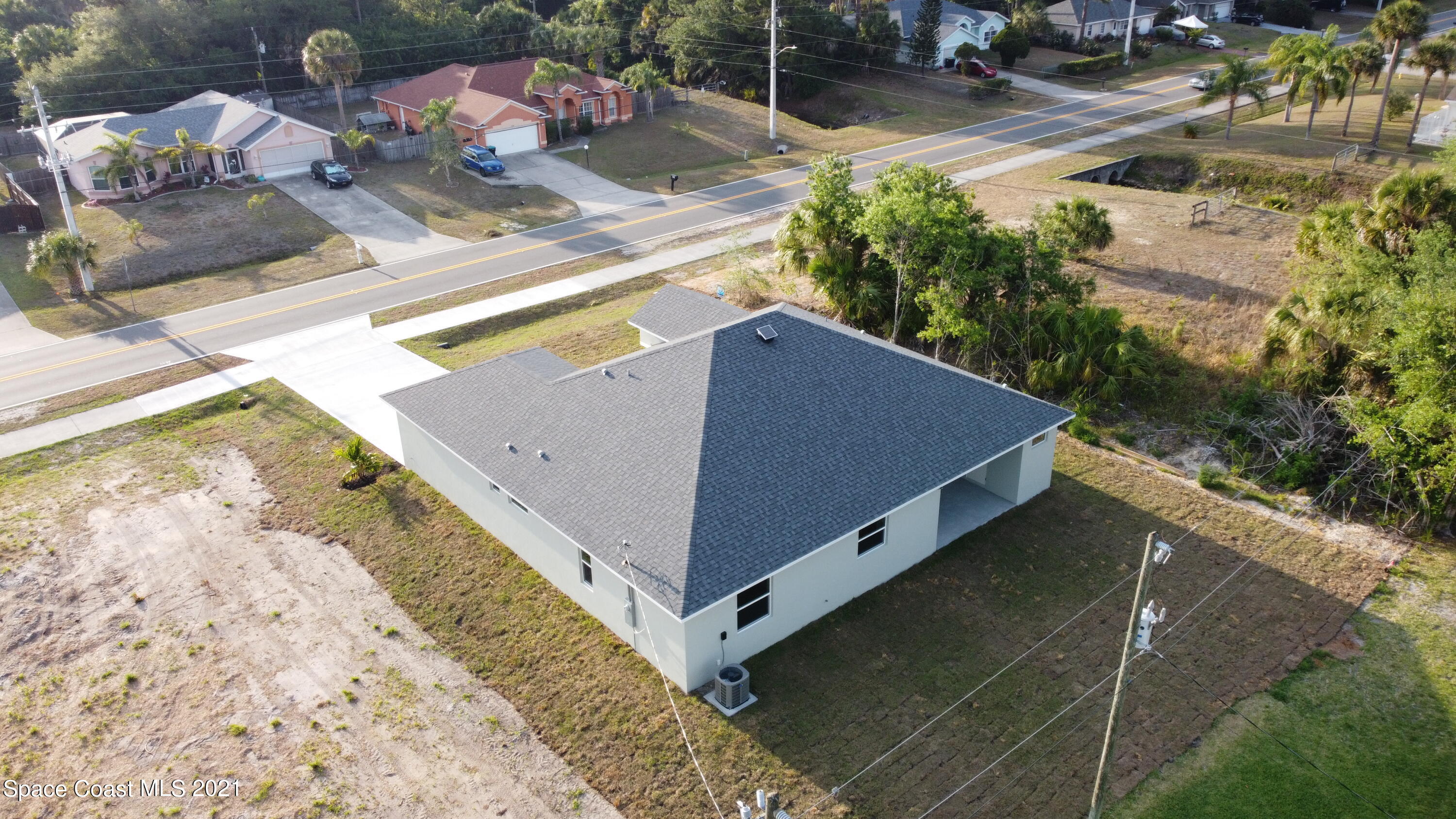 1335 Paragon Road Southeast Palm Bay, FL 32909 - Photo 34 of 34 Photo_6619286_DJI_150_jpg_4409121_0_2021