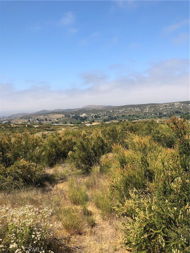 27 Rocky Knoll Road Hemet, CA 92544 - Photo 1 of 5 a view of a city with ocean view