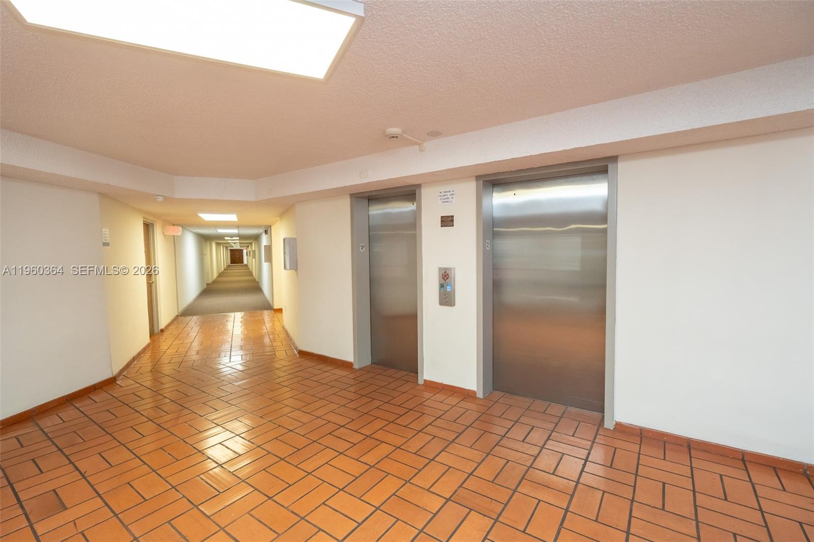 5800 Southwest 127th Avenue, Unit 2220 Miami, FL 33183 - Photo 21 of 36 a view of a hallway