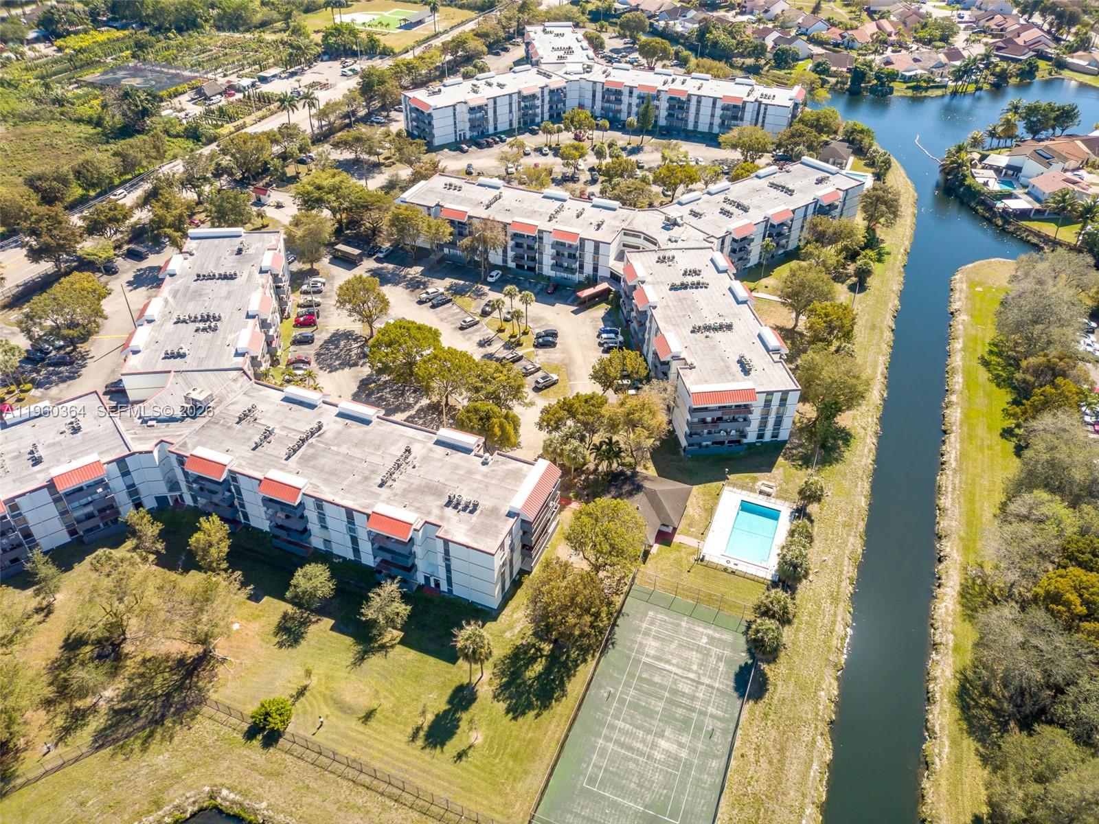 5800 Southwest 127th Avenue, Unit 2220 Miami, FL 33183 - Photo 29 of 36 a picture of houses with outdoor space