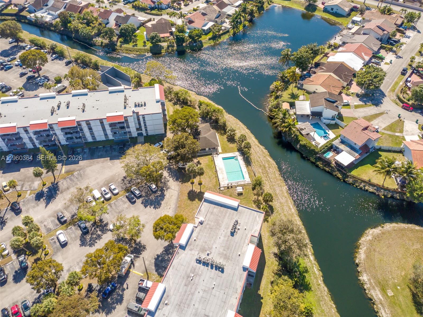 5800 Southwest 127th Avenue, Unit 2220 Miami, FL 33183 - Photo 31 of 36 an aerial view of a house with a lake view