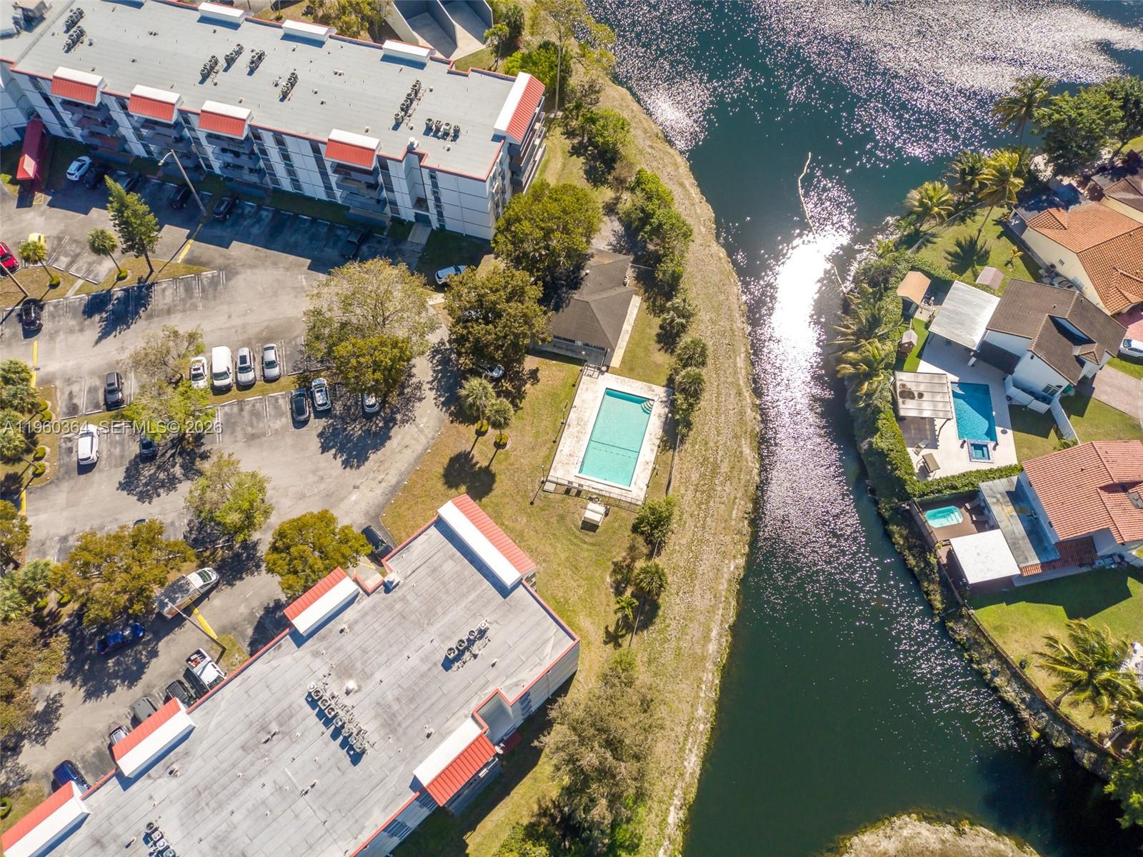 5800 Southwest 127th Avenue, Unit 2220 Miami, FL 33183 - Photo 32 of 36 an aerial view of a house with a lake view