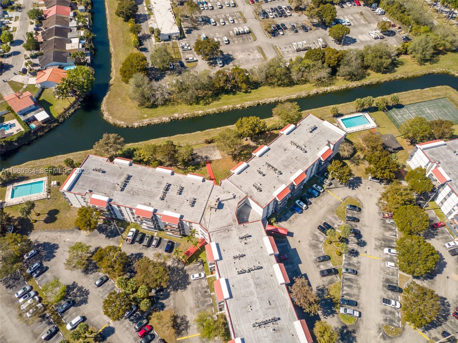 5800 Southwest 127th Avenue, Unit 2220 Miami, FL 33183 - Photo 34 of 36 an aerial view of a residential houses with outdoor space