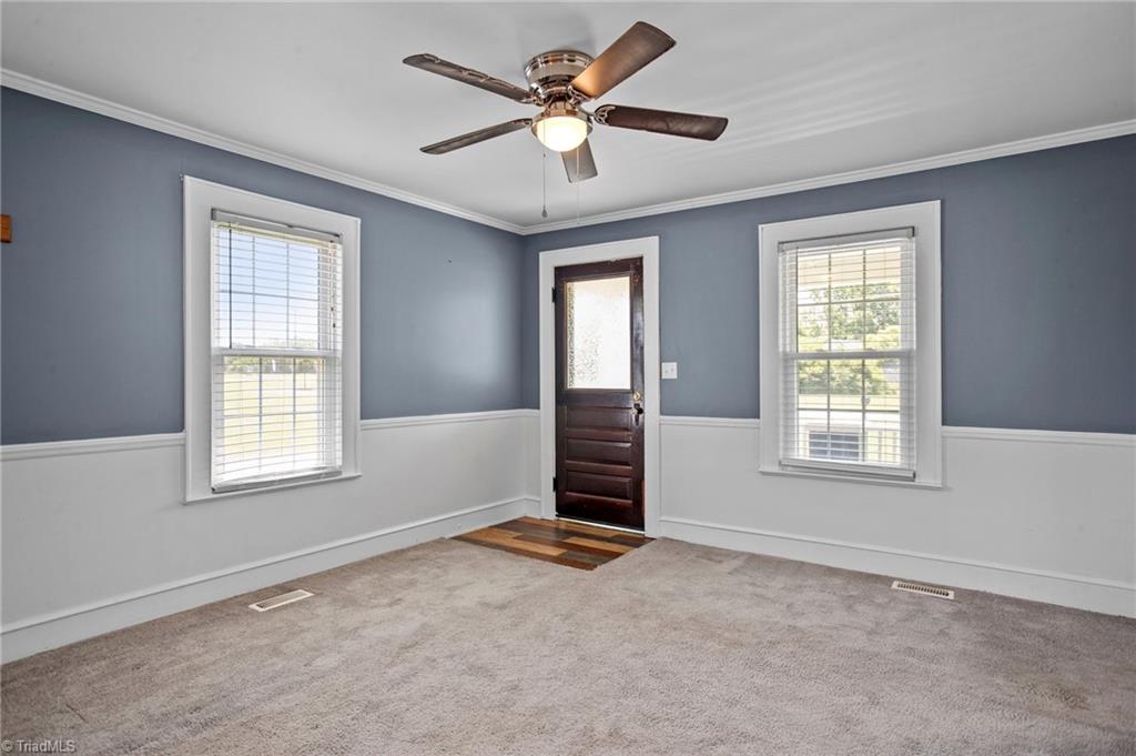 119 Boone Road Burlington, NC 27217 - Photo 4 of 40 Living Area with wood flooring and ceiling fans