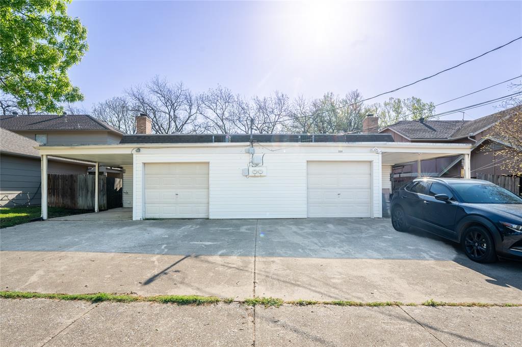 604 Windgate Court Arlington, TX 76012 - Photo 18 of 19 a view of a car garage