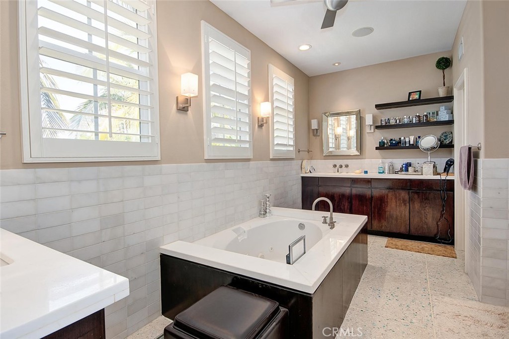 43 Carpenteria Irvine, CA 92602 - Photo 15 of 43 a bathroom with a sink and a bathtub