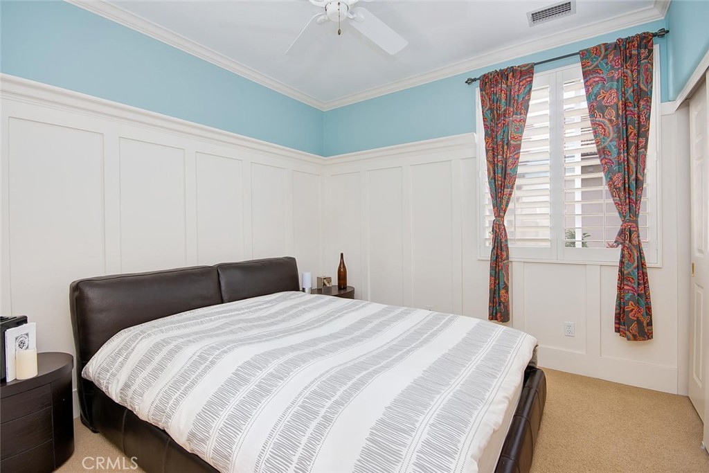43 Carpenteria Irvine, CA 92602 - Photo 16 of 43 a bedroom with a bed and a window