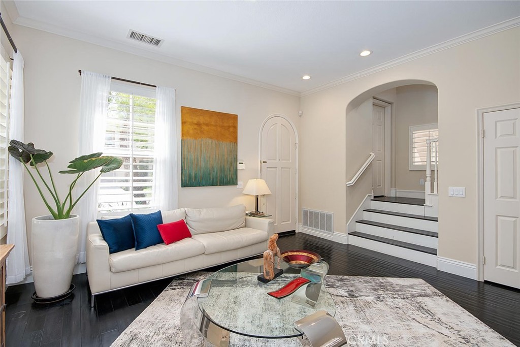 43 Carpenteria Irvine, CA 92602 - Photo 7 of 43 a living room with furniture and wooden floor