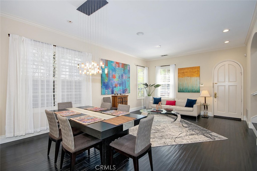 43 Carpenteria Irvine, CA 92602 - Photo 8 of 43 a view of a dining room with furniture window and wooden floor