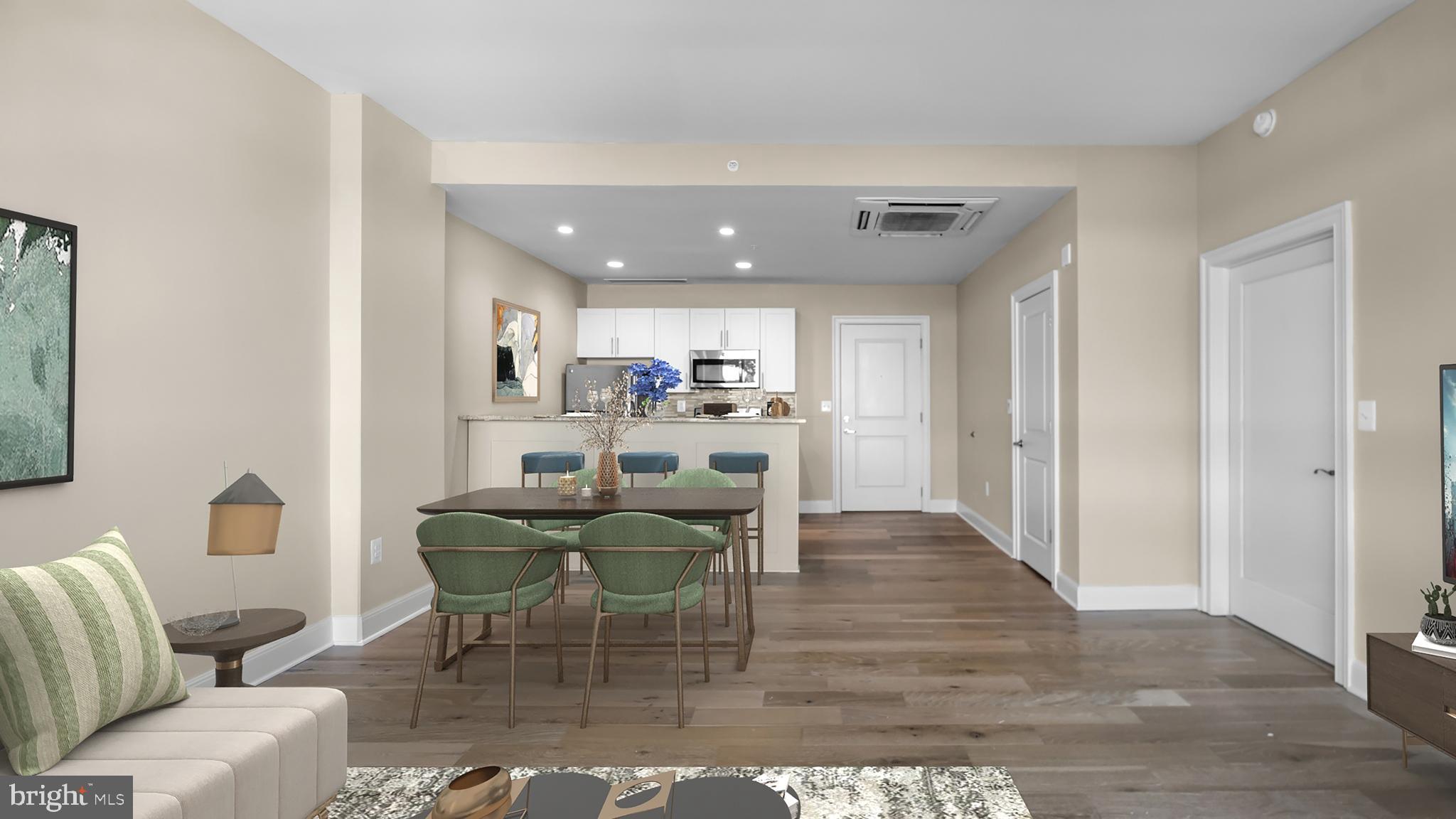 235 North Christopher Columbus Boulevard, Unit 914 Philadelphia, PA 19106 - Photo 22 of 56 a view of a dining room with furniture