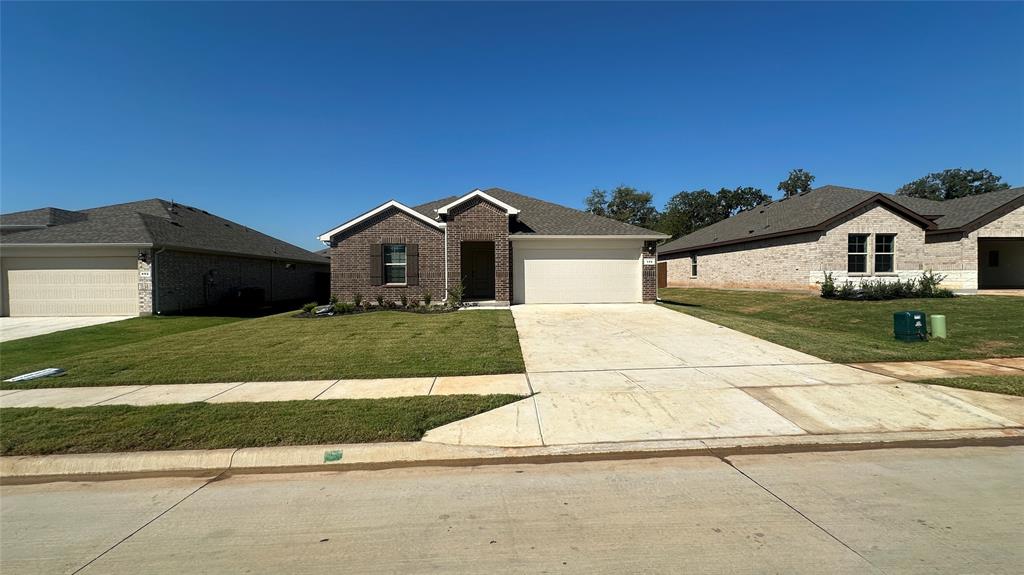 356 Lubbock Drive Azle, TX 76020 - Photo 15 of 16 Street View - D.R. Horton's Kingston floor plan elevation A-All Home and community information, including pricing, included features, terms, availability and amenities, are subject to change at any time without notice or obligation. All Drawings, pictures, photographs, video, square footages, floor plans, elevations, features, colors and sizes are approximate for illustration purposes only and will vary from the homes as built.