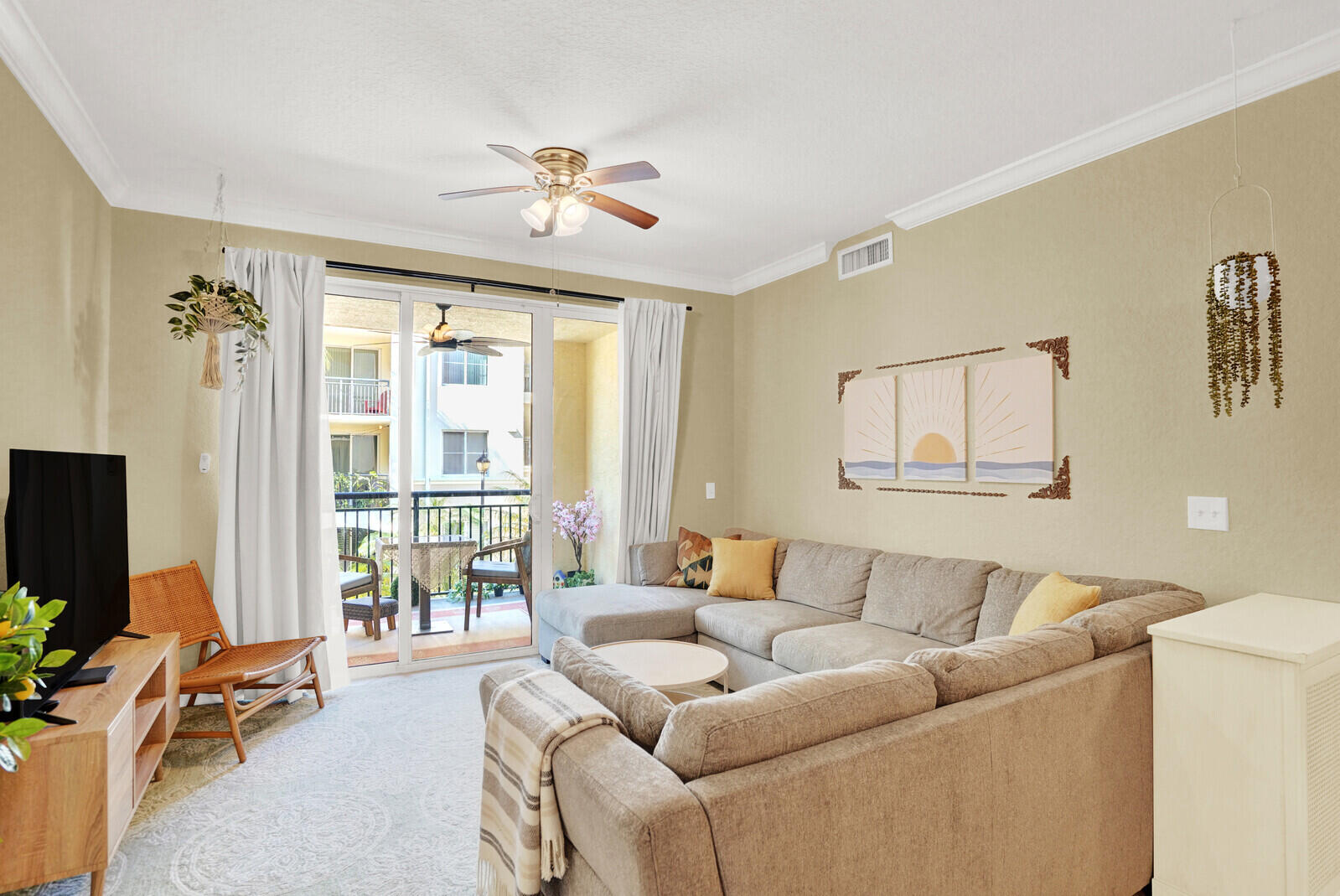 1201 Renaissance Way, Unit 201 Boynton Beach, FL 33426 - Photo 11 of 29 a living room with furniture and a flat screen tv
