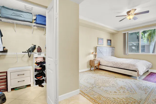 a bedroom with a bed and a cabinets