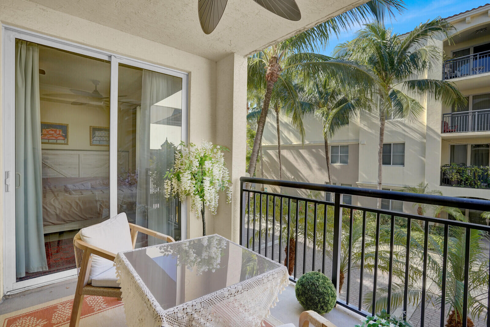 1201 Renaissance Way, Unit 201 Boynton Beach, FL 33426 - Photo 27 of 29 a view of a balcony with a potted plant