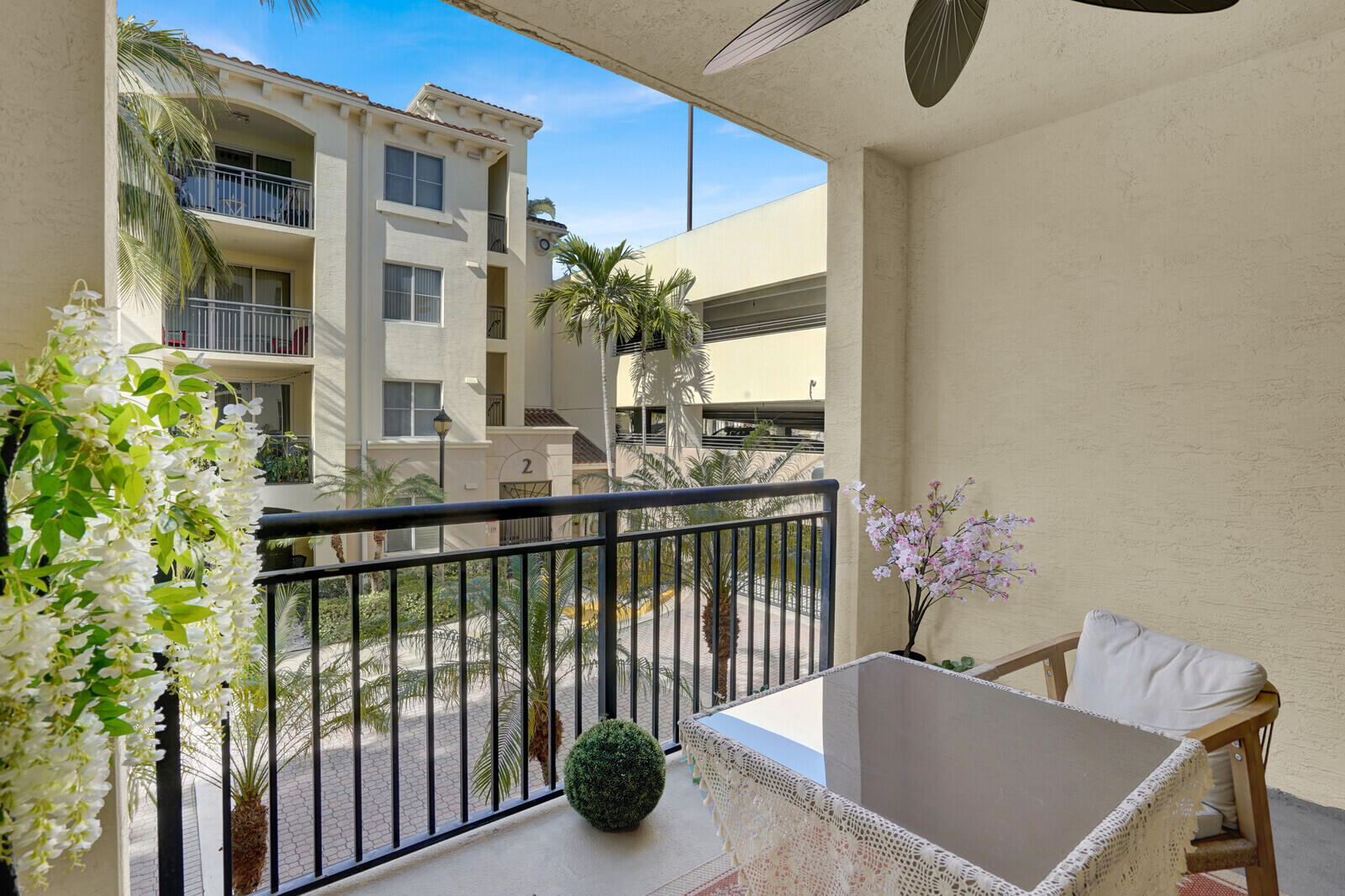 1201 Renaissance Way, Unit 201 Boynton Beach, FL 33426 - Photo 28 of 29 a view of a balcony with furniture