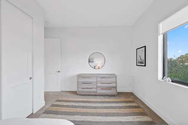 a bathroom with a double vanity sink toilet and shower