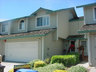 48 Regents Circle Rohnert Park, CA 94928 - Photo 2 of 6 a front view of a house with a yard