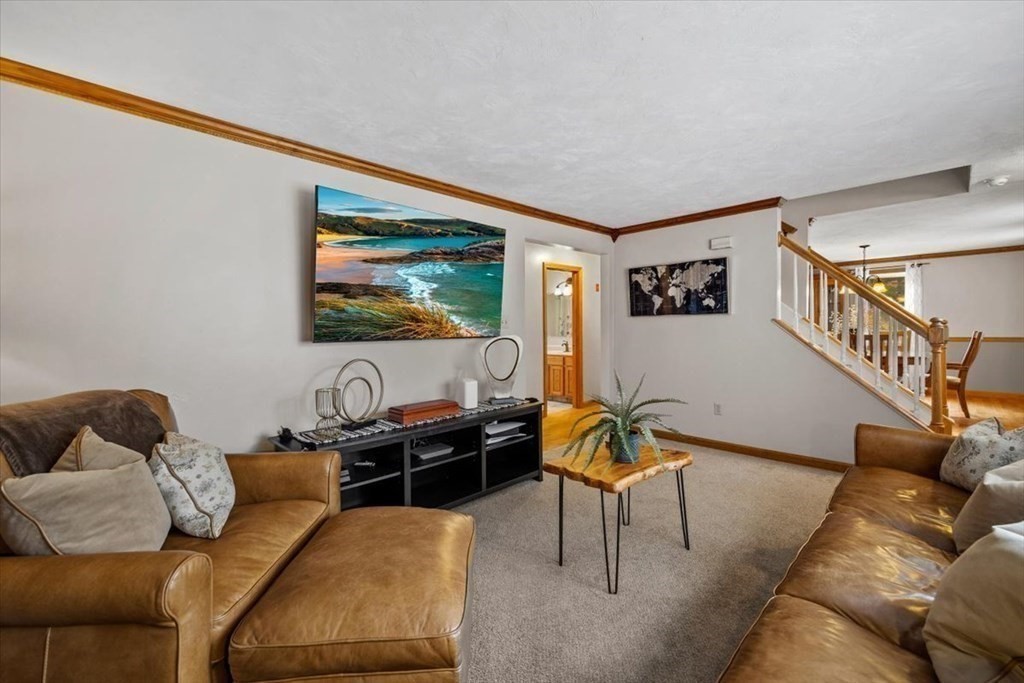 5 Stacey Road Middleboro, MA 02346 - Photo 17 of 40 a living room with furniture and a flat screen tv