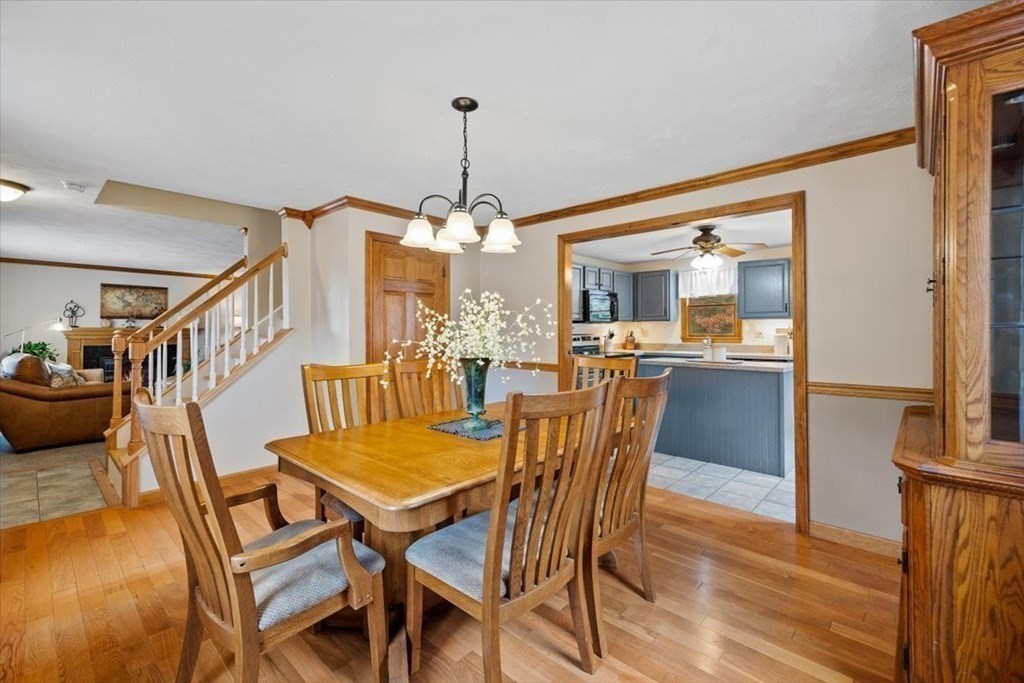 5 Stacey Road Middleboro, MA 02346 - Photo 18 of 40 a view of a dining room with furniture and wooden floor