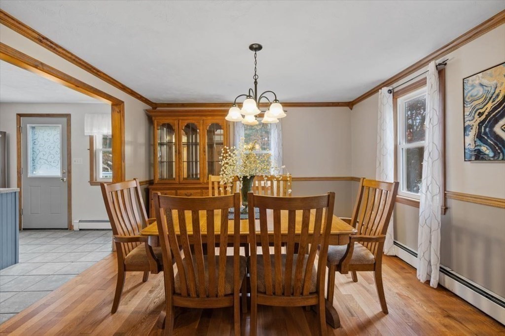 5 Stacey Road Middleboro, MA 02346 - Photo 19 of 40 a view of a dining room with furniture window and wooden floor