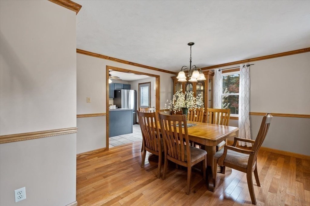 5 Stacey Road Middleboro, MA 02346 - Photo 20 of 40 a view of a dining room with furniture window and wooden floor
