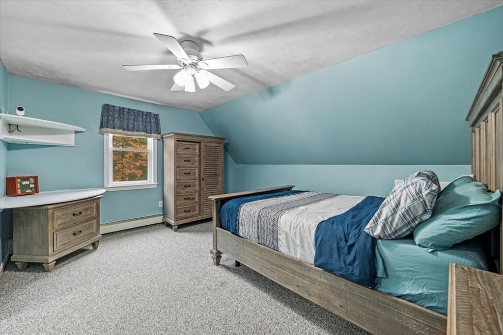 5 Stacey Road Middleboro, MA 02346 - Photo 28 of 40 a bedroom with a bed and a ceiling fan