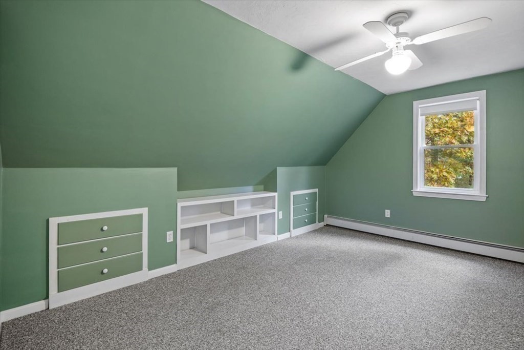 5 Stacey Road Middleboro, MA 02346 - Photo 36 of 40 an empty room with windows and ceiling fan