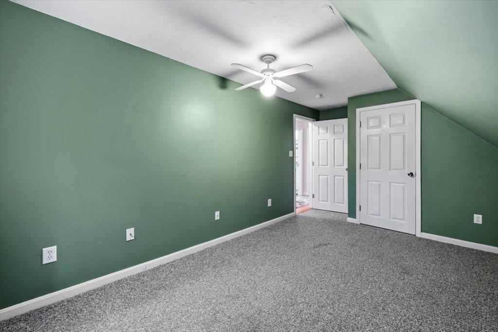 5 Stacey Road Middleboro, MA 02346 - Photo 37 of 40 an empty room and chandelier fan