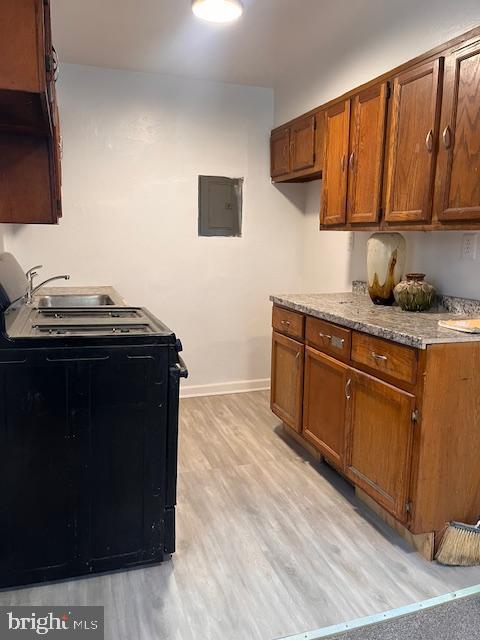 4757 South Capitol Terrace Southwest Washington, DC 20032 - Photo 15 of 18 a kitchen with stainless steel appliances granite countertop a stove a sink and a microwave