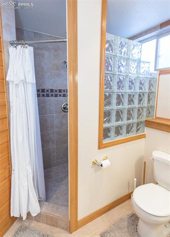 6925 Forestgate Road Colorado Springs, CO 80908 - Photo 29 of 36 Shower in basement bathroom