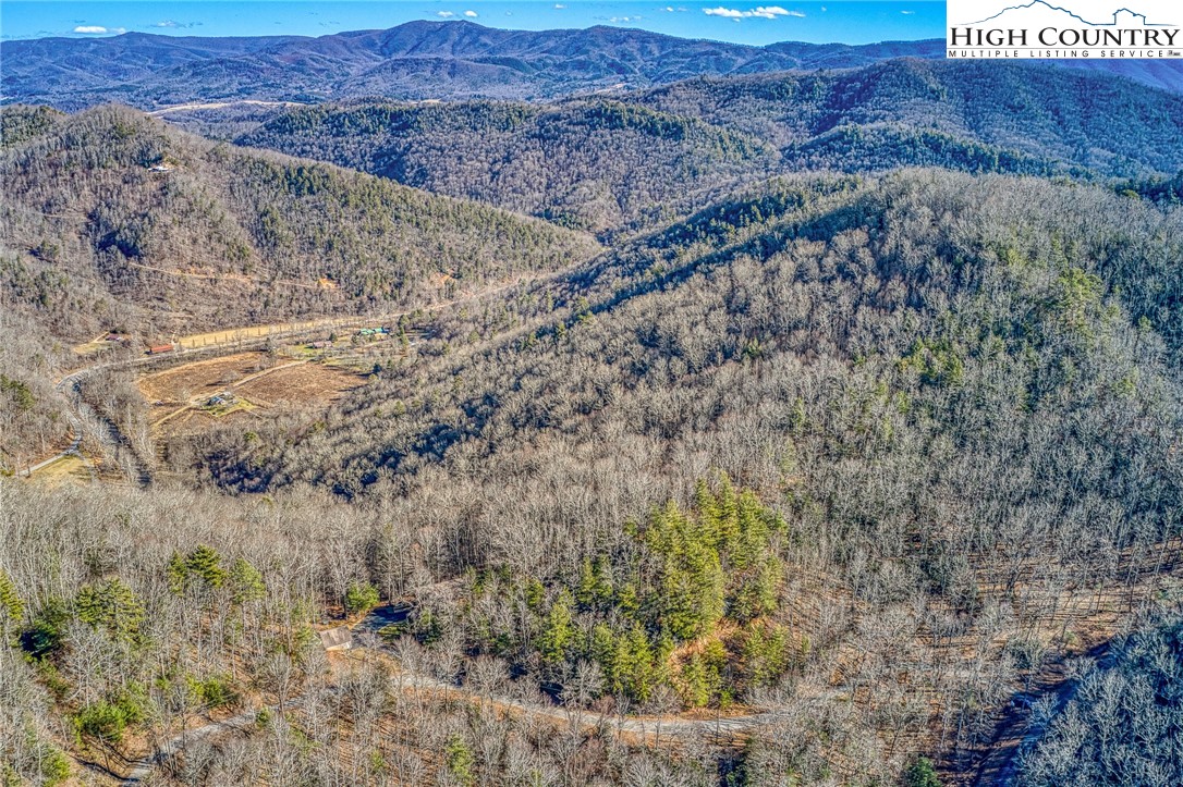 Lot 32 Sunset Ridge Butler, TN 37640 - Photo 12 of 17 a view of a dry field with trees in the background