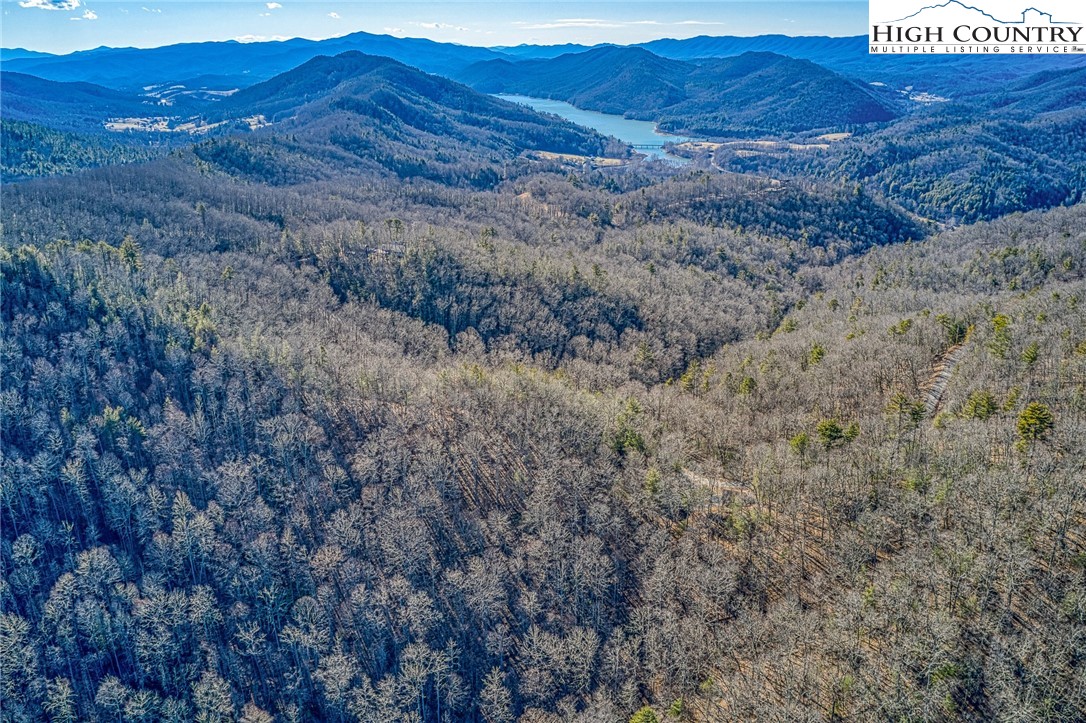 Lot 32 Sunset Ridge Butler, TN 37640 - Photo 15 of 17 a view of a dry yard with mountains in the background