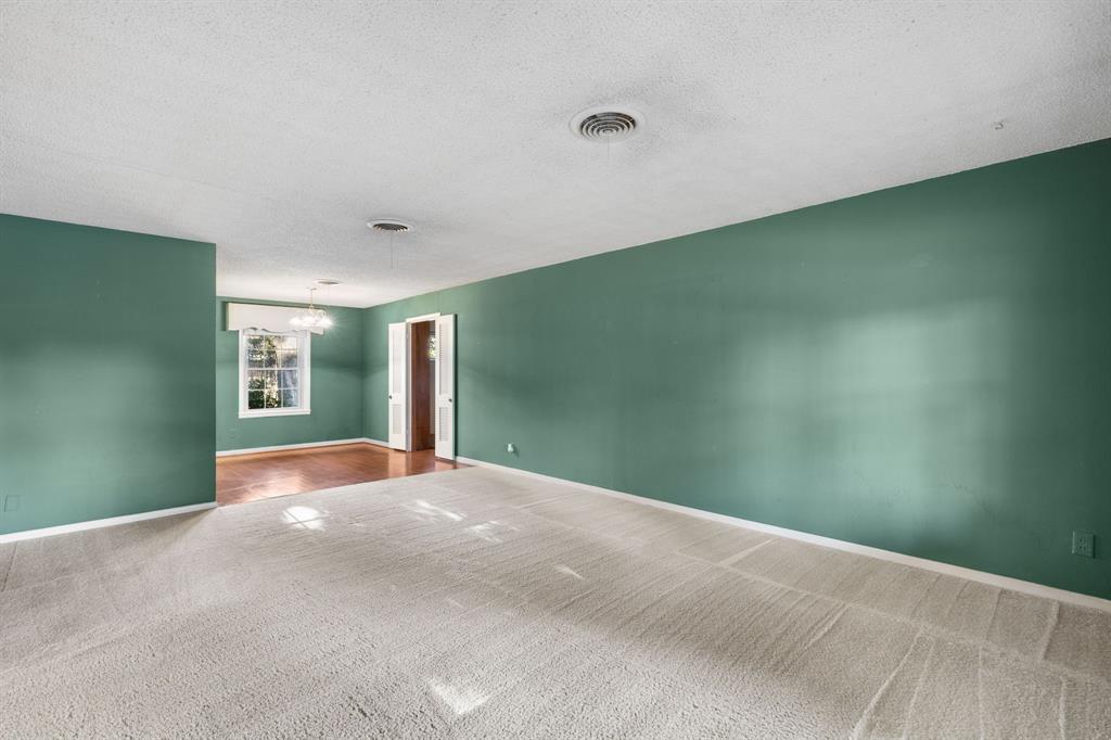 4906 Greenbriar Road Wichita Falls, TX 76302 - Photo 6 of 33 a view of an empty room with a window