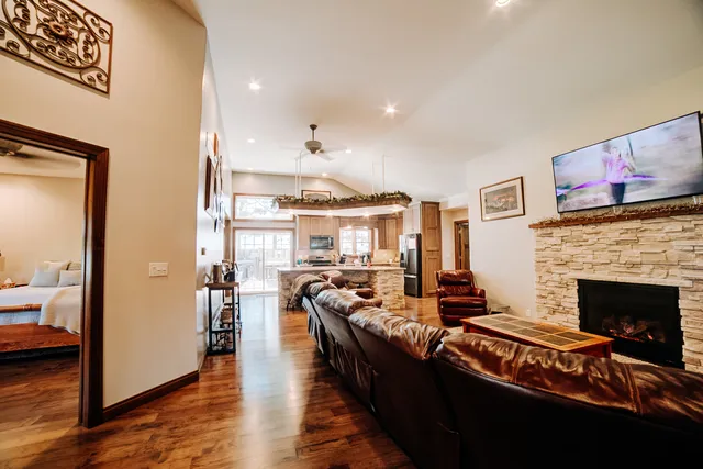 a kitchen with stainless steel appliances a refrigerator and cabinets