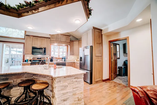 a view of walk in closet with clothes