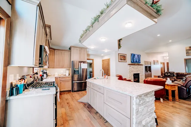 a bedroom with furniture and a chandelier